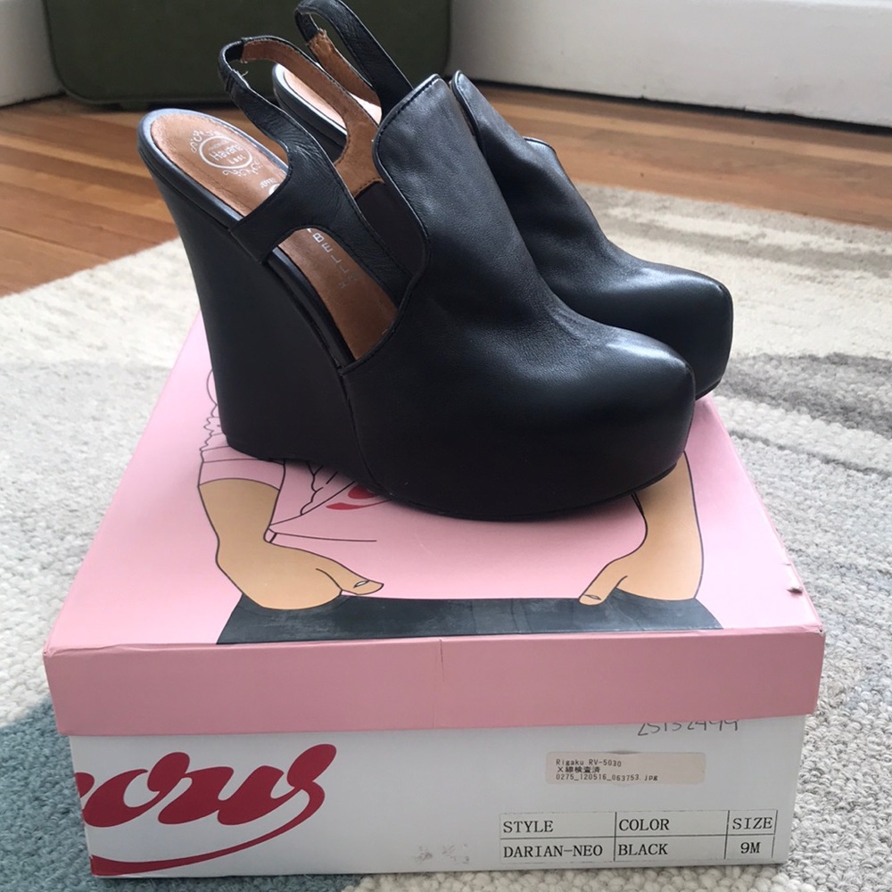 Jeffrey Campbell black leather platform wedges.